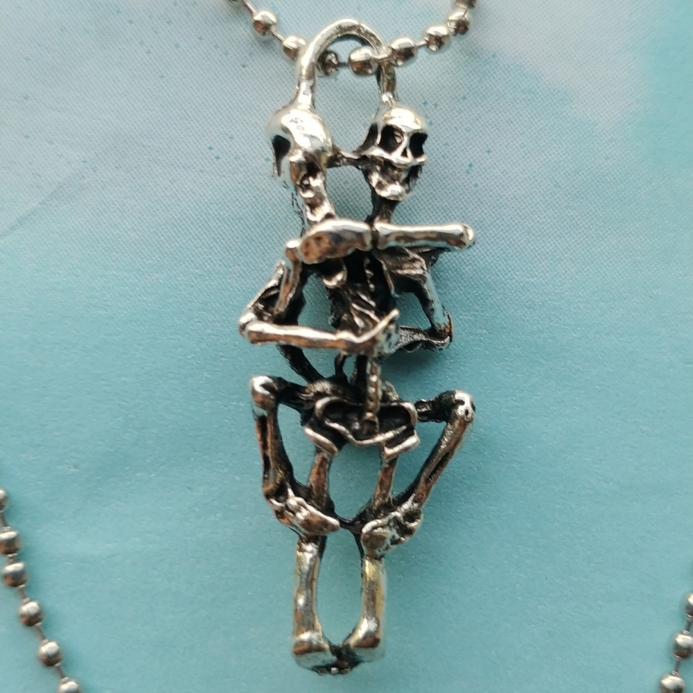Entertwined Skeleton Lovers Necklace.